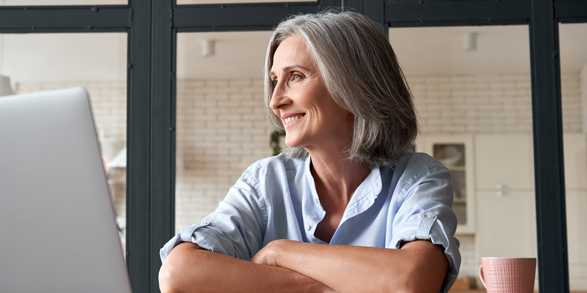 Nice lady at home smiling after getting her teeth in the same day